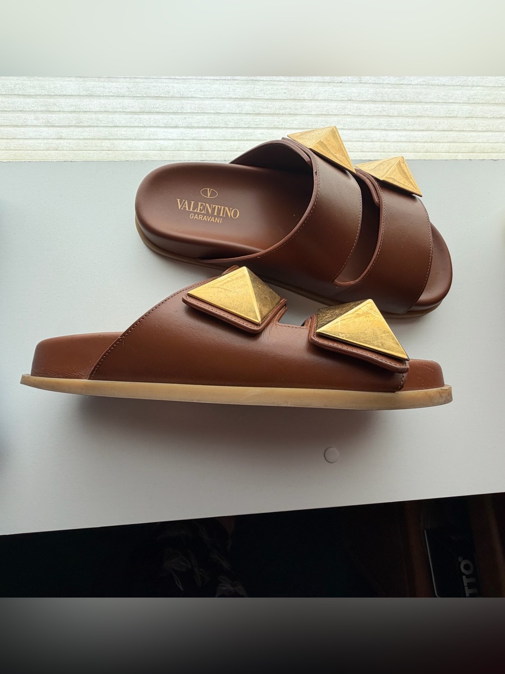 Valentino Garavani Brown Leather Slide Sandals with Gold Pyramid Studs